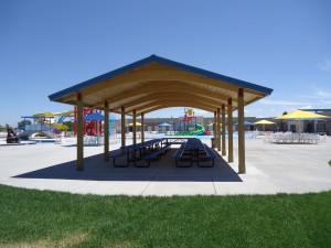 Take time to rest in the shade under one of the shelters after swimming and enjoying the sun at Rexburg Rapids
