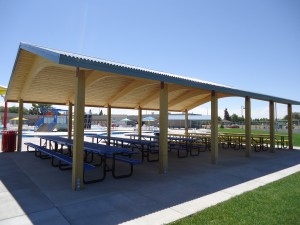 Take time to rest in the shade under one of the shelters after swimming and enjoying the sun at Rexburg Rapids